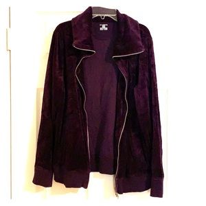 Dark purple jacket/pant sweatsuit.